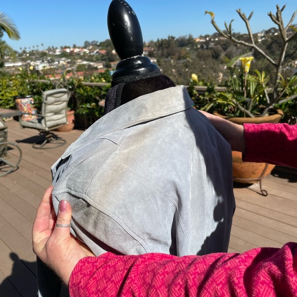 100 % Leather feels like suede. Pretty blue and lined. Needs to be dry cleaned. - Picture 3 of 6